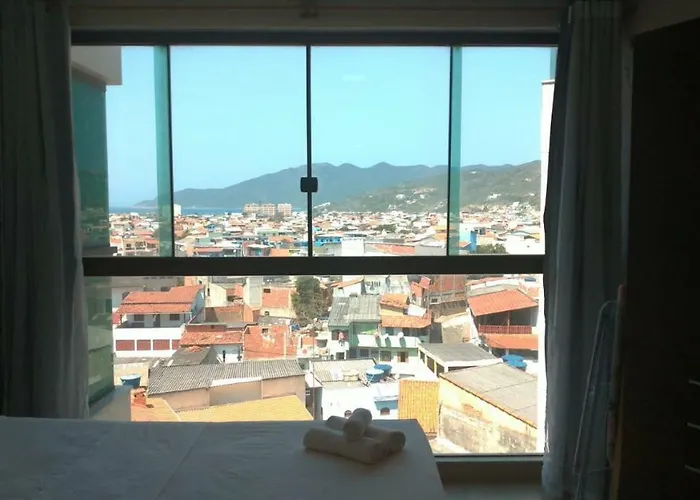 Aluguéis de temporada: Loft Praia Grande